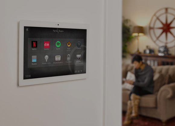 a monitor on a wall inside a home providing Whole Home Automation in Short Hills, NJ, Mendham, Chatham, NJ, Ridgewood, NJ, Wyckoff, Franklin Lakes