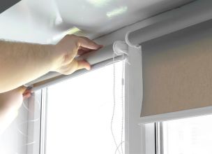 Installing motorized shades on a window in Short Hills