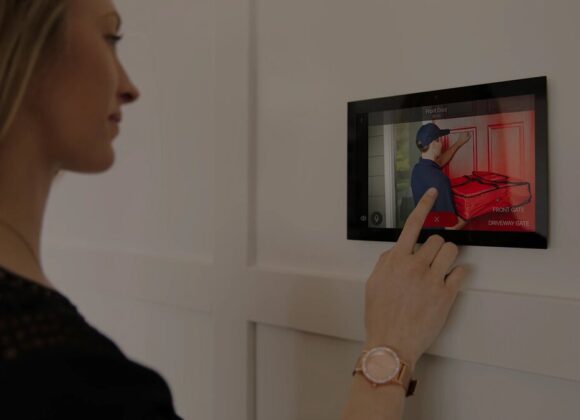 Control4 Systems smart home touchscreen at an entry in New City
