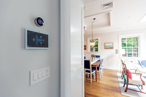 Wall touchscreen and Lutron lighting controls for a smart home thermostat in Mahwah
