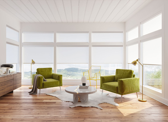 Bright sunroom with automatic roller shades and smart home blinds on tall windows in Wyckoff