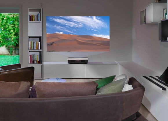 Living room with a projector image on the wall for a home theater installation in Montclair