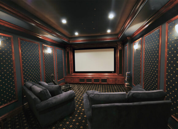 Traditional home theater design with a projection screen and starlit ceiling in Tuxedo Park