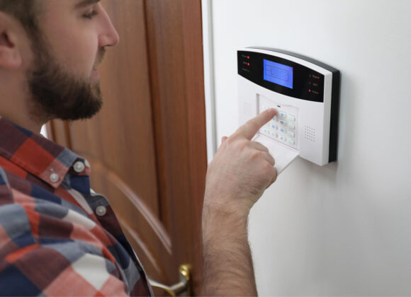 Using a home automation security keypad by an entry door in Ho-Ho-Kus