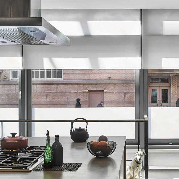 Lutron automated shades over large kitchen windows in Tribeca