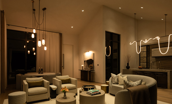 Lutron lighting controls setting a warm evening scene in a Saddle River living room
