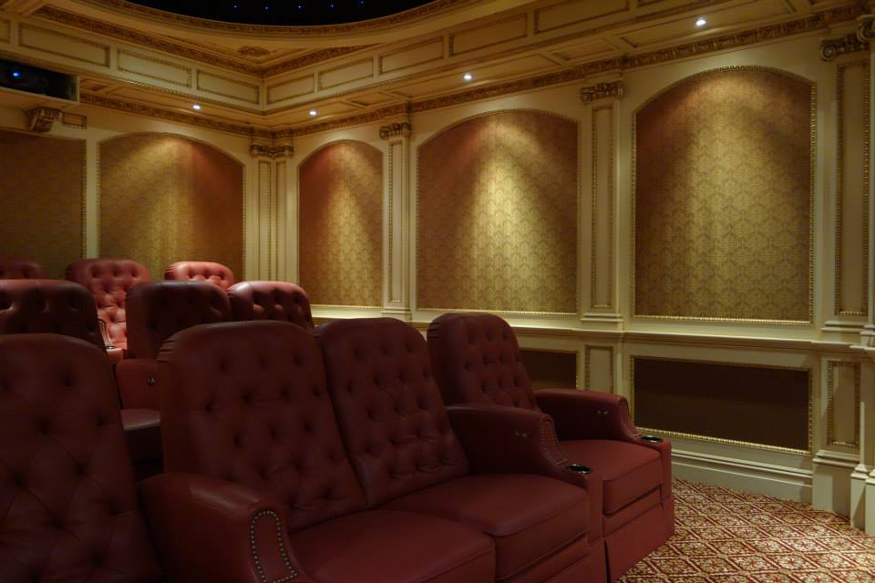 Luxury home theater with tufted leather recliners and a starlit ceiling in Saddle River