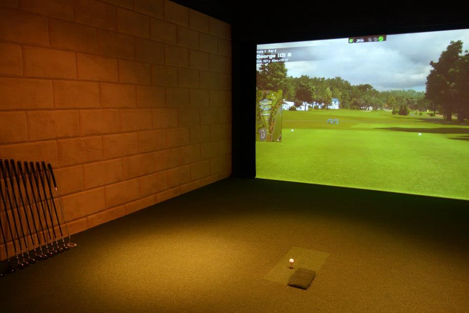Golf simulator room with a projection screen for a home theater installation in Saddle River