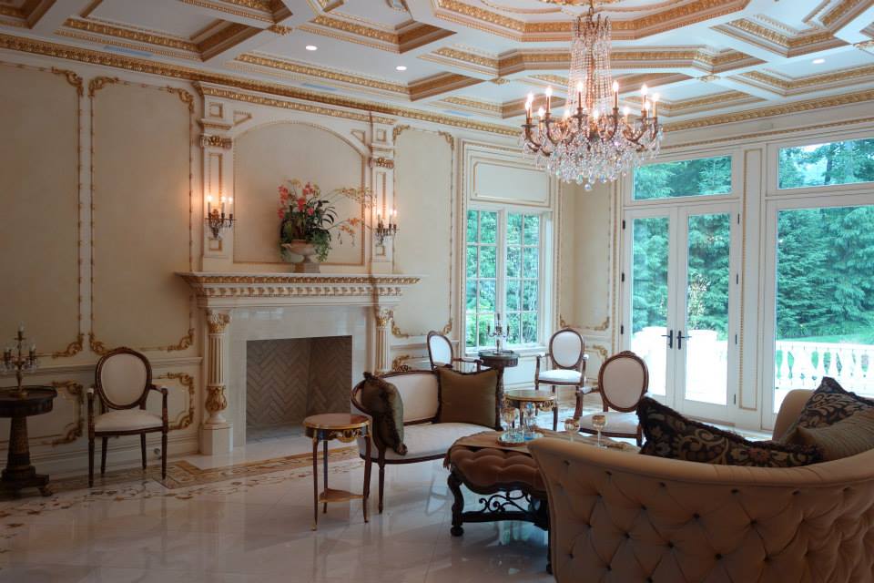 Ornate formal living room with a chandelier and a home A/V installation in Saddle River