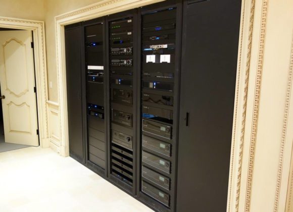 Home automation equipment rack with audio and video components in Saddle River
