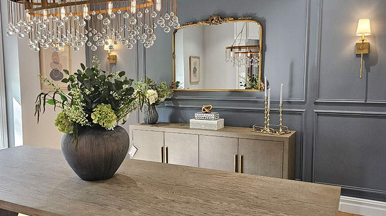 Dining room with a crystal chandelier and architectural lighting design in Short Hills
