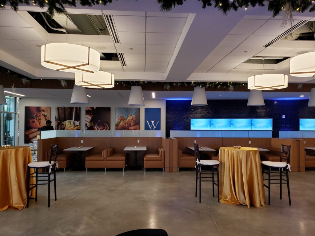 Corporate event lounge with a commercial video wall and architectural lighting in Mendham